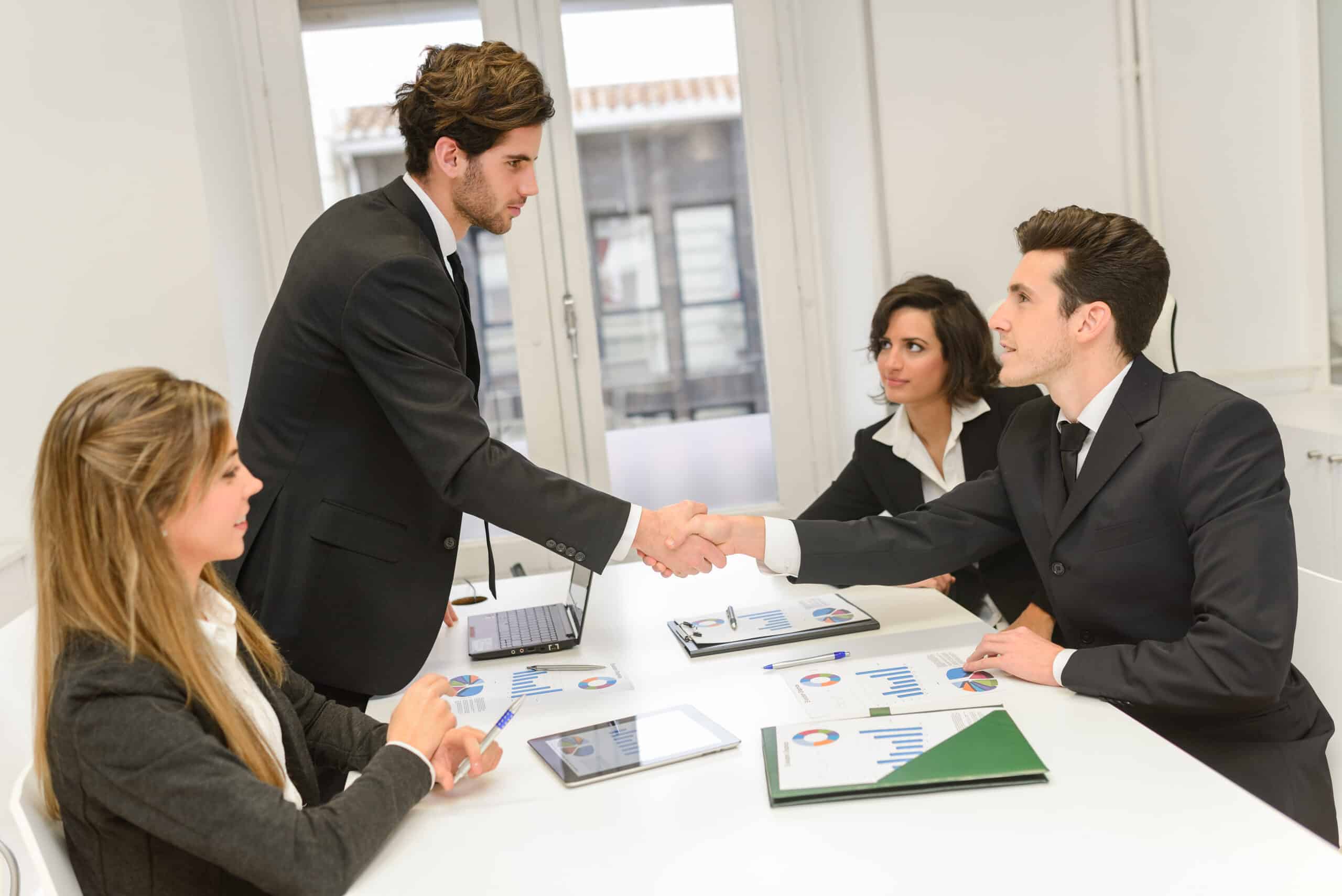 Business handshake during a professional meeting.